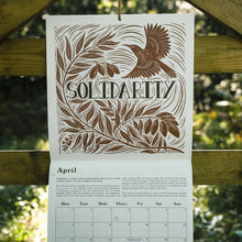 Load image into Gallery viewer, 2026 Lino Cut Calendar with artwork to inspire hope and action on the land
